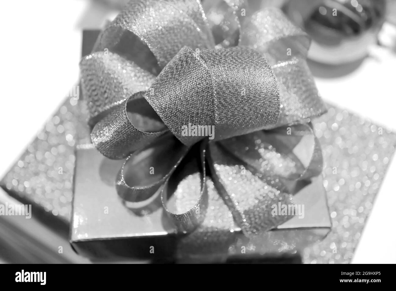 Confezione regalo Closeup glitter in monocromia per il concetto di Celebration Foto Stock