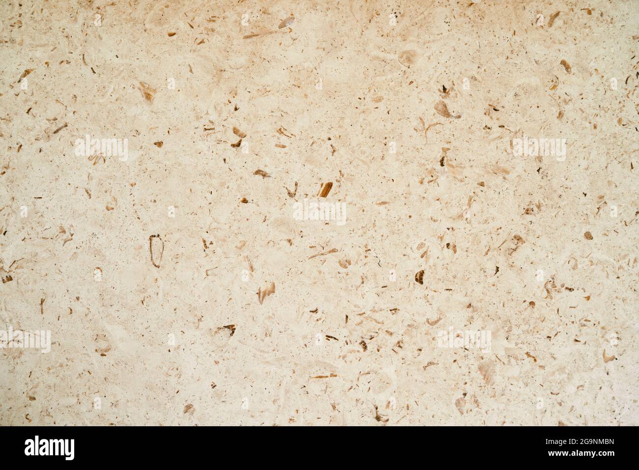 Marmo beige con spruzzi. Primo piano Foto Stock