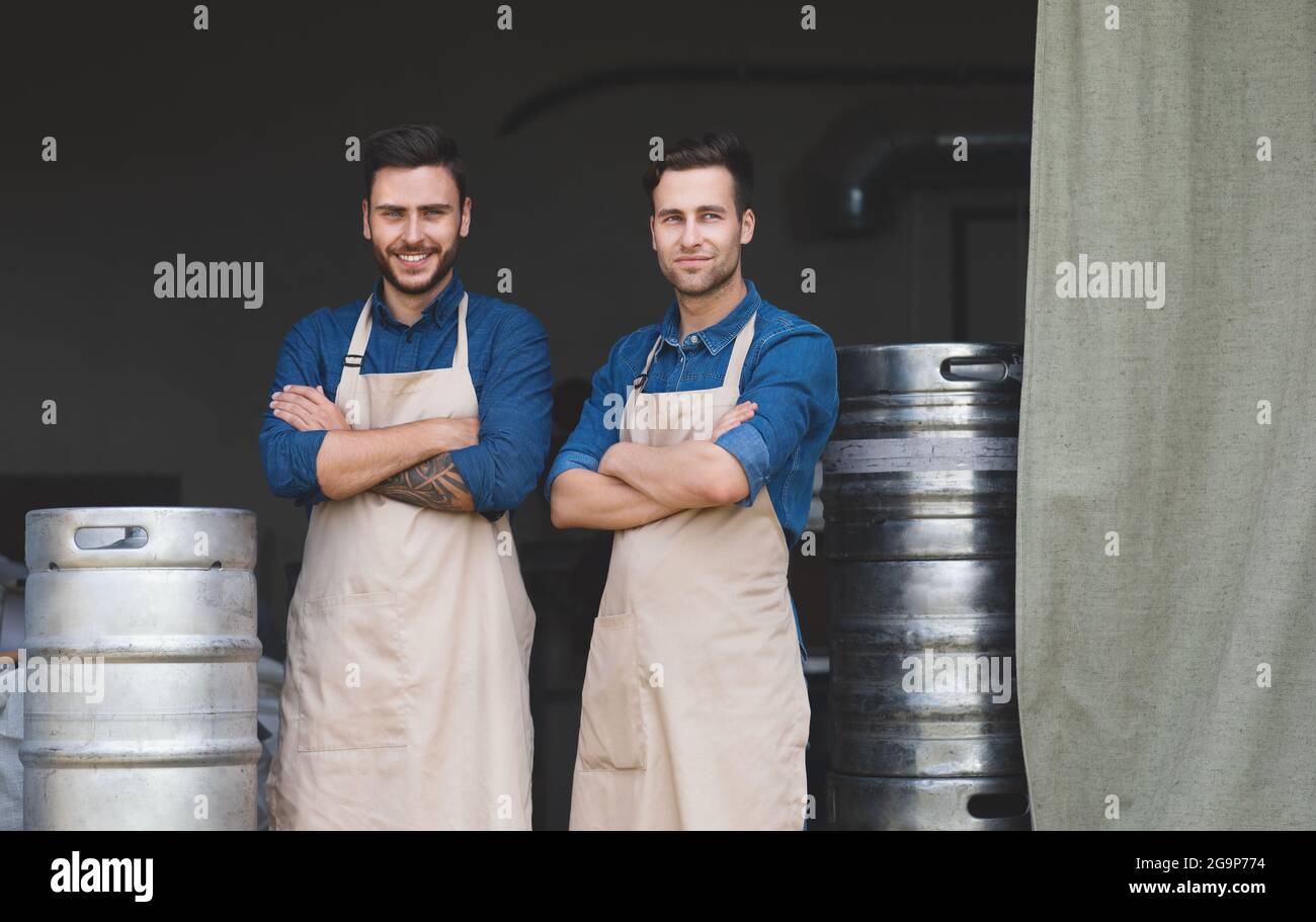 Business di successo della famiglia, proprietari di impianti, giovani uomini d'affari Foto Stock
