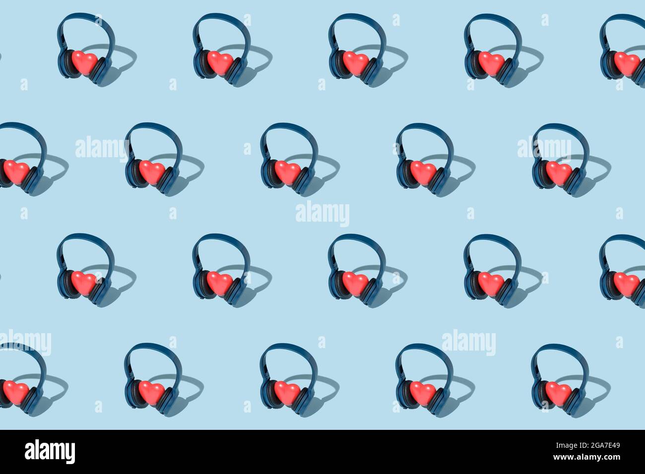 Pattern con cuffie e cuori concetto di ascolto di musica con i cuori. Festa contemporanea. Foto Stock
