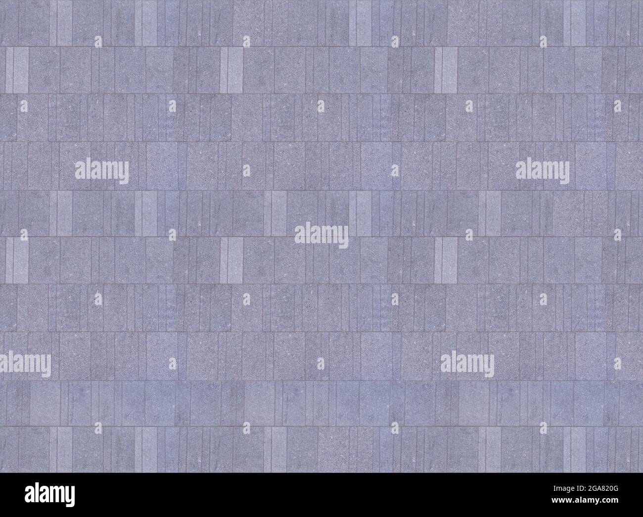 Parete esterna dell'edificio in pietra artificiale grigio chiaro, struttura senza cuciture Foto Stock