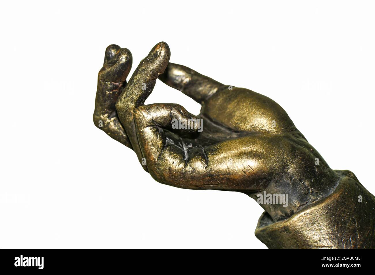 La mano in bronzo mostra i gesti con le dita, isolare. Foto Stock