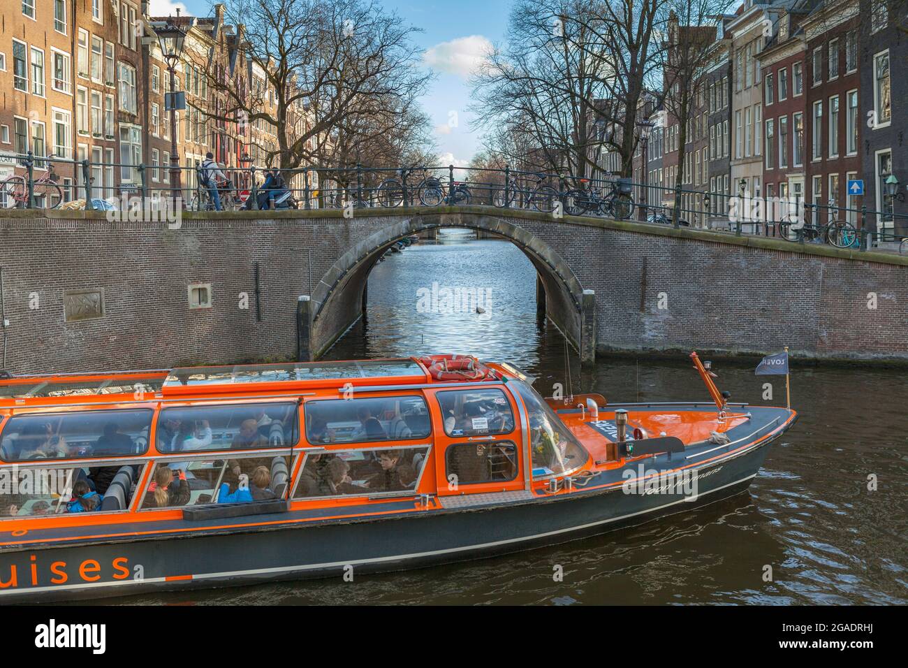 Cruiser arancione a Herengrach, Amsterdam, Olanda Foto Stock