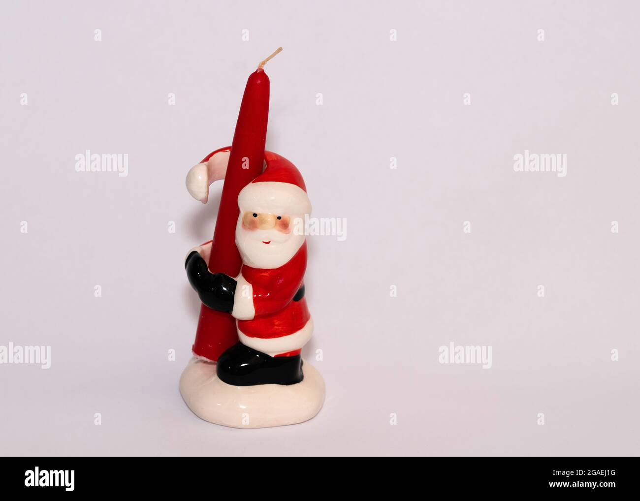 Padre natale novità portacandele con candela Foto Stock