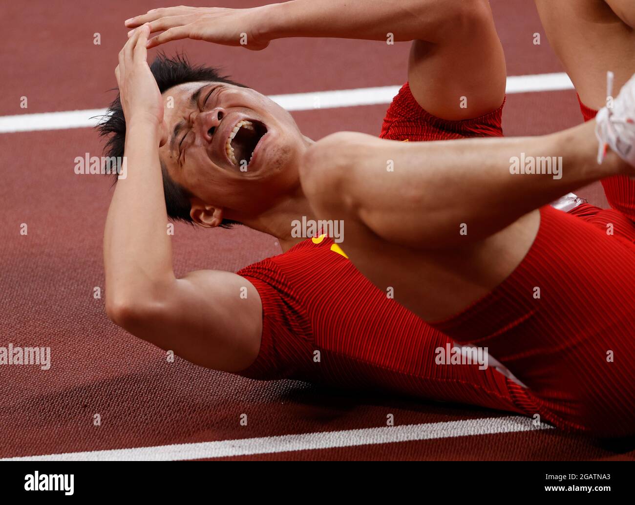 01 agosto 2021, Giappone, Tokio: Atletica: Olimpiadi, 100m, uomini, Calore preliminare, Bingtian su (Cina) Foto: Oliver Weiken/dpa Foto Stock