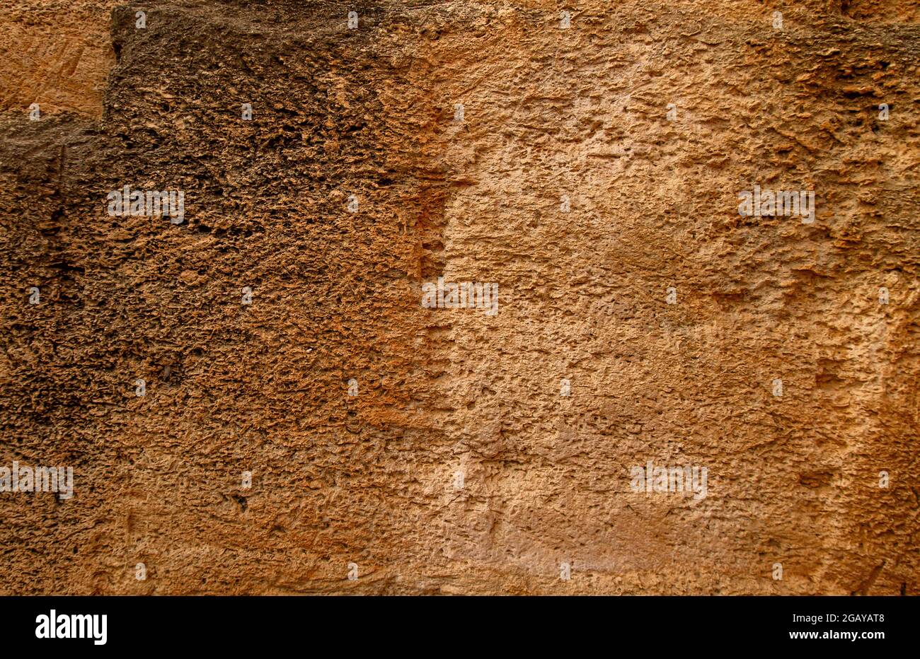 Dettaglio della struttura delle pareti in cava di arenaria ruvida e porosa Foto Stock