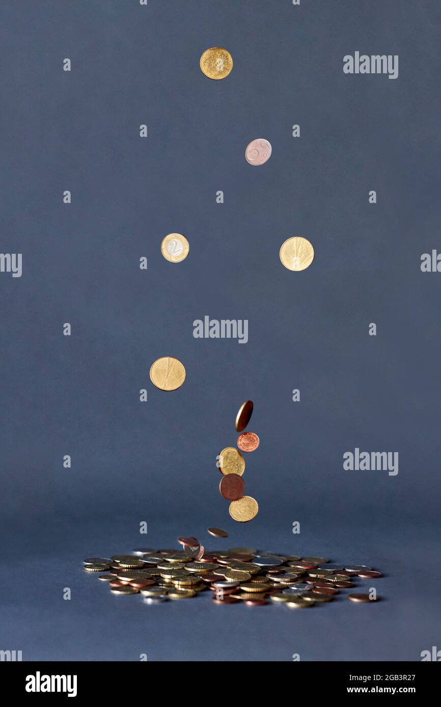 primo piano di una pila di monete d'oro per foto vettoriali Foto Stock