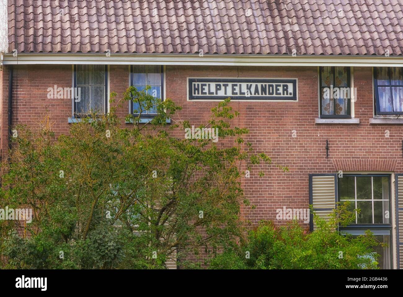 Casa chiamata Helpt Elkander (aiutarsi a vicenda) nelle colonie di Benevolance a Veenhuizen, Drenthe nei Paesi Bassi. Uno dei primi e grandi Foto Stock