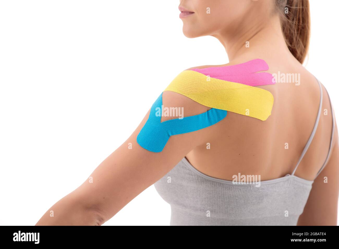 bendaggio funzionale dinamico con nastro su grembialatura femminile isolato  su sfondo bianco Foto stock - Alamy