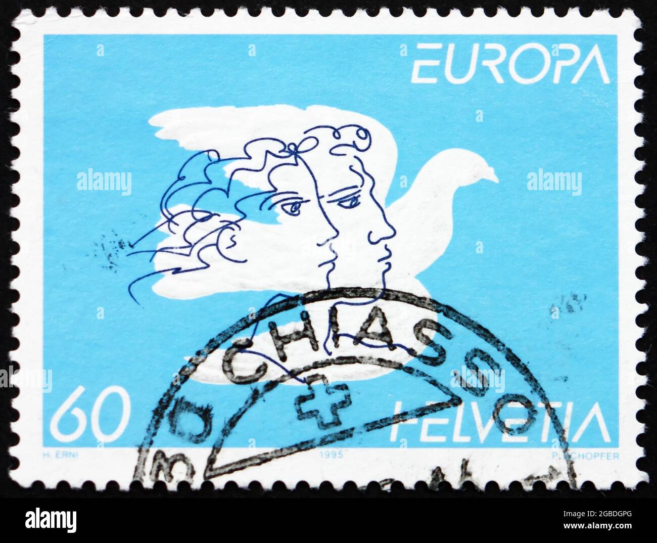 SVIZZERA - CIRCA 1995: Un francobollo stampato in Svizzera mostra dove e volti, Pace e libertà, intorno al 1995 Foto Stock