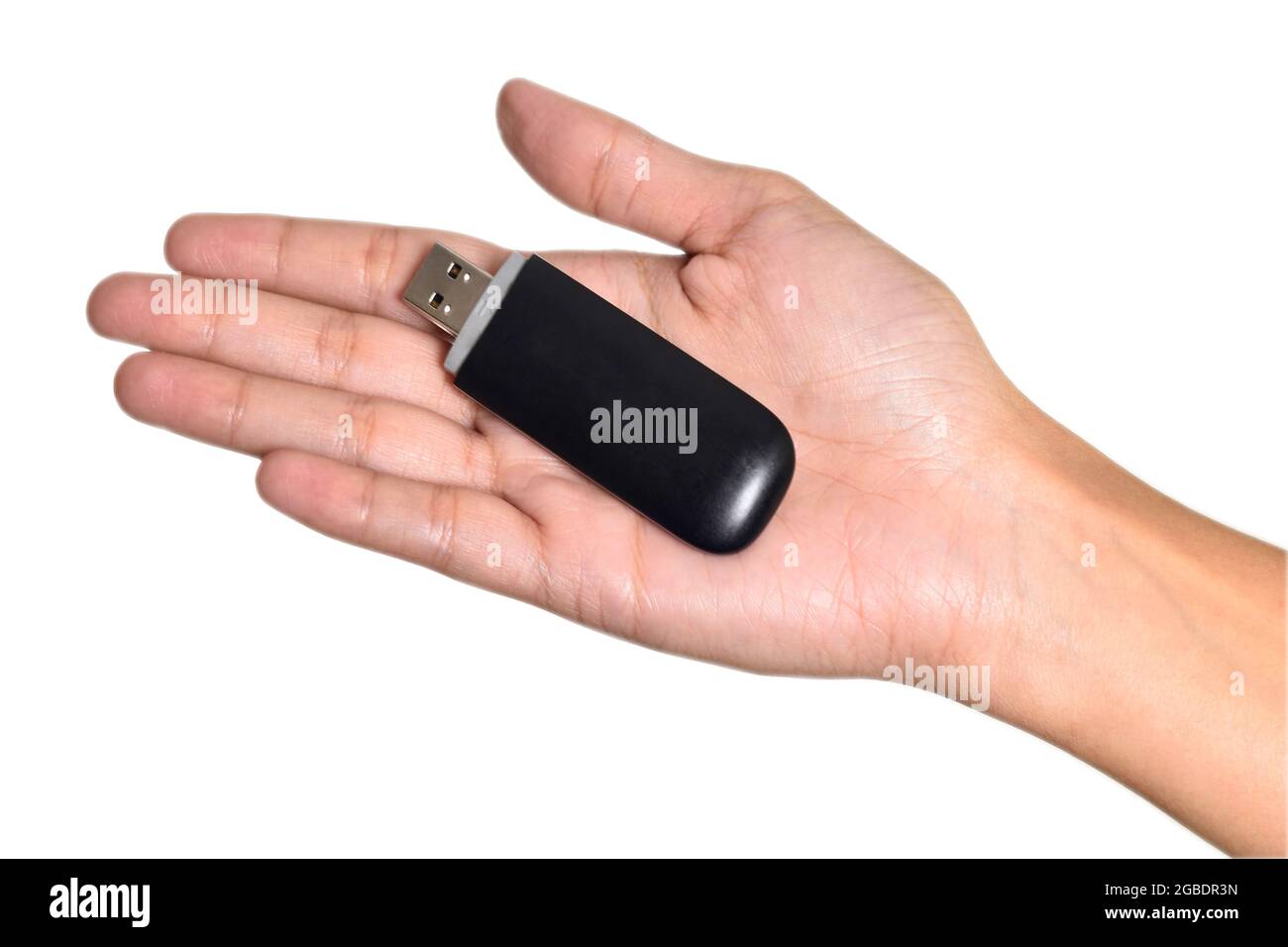 Internet Dongle in mano isolato su sfondo bianco con Clipping path Foto Stock