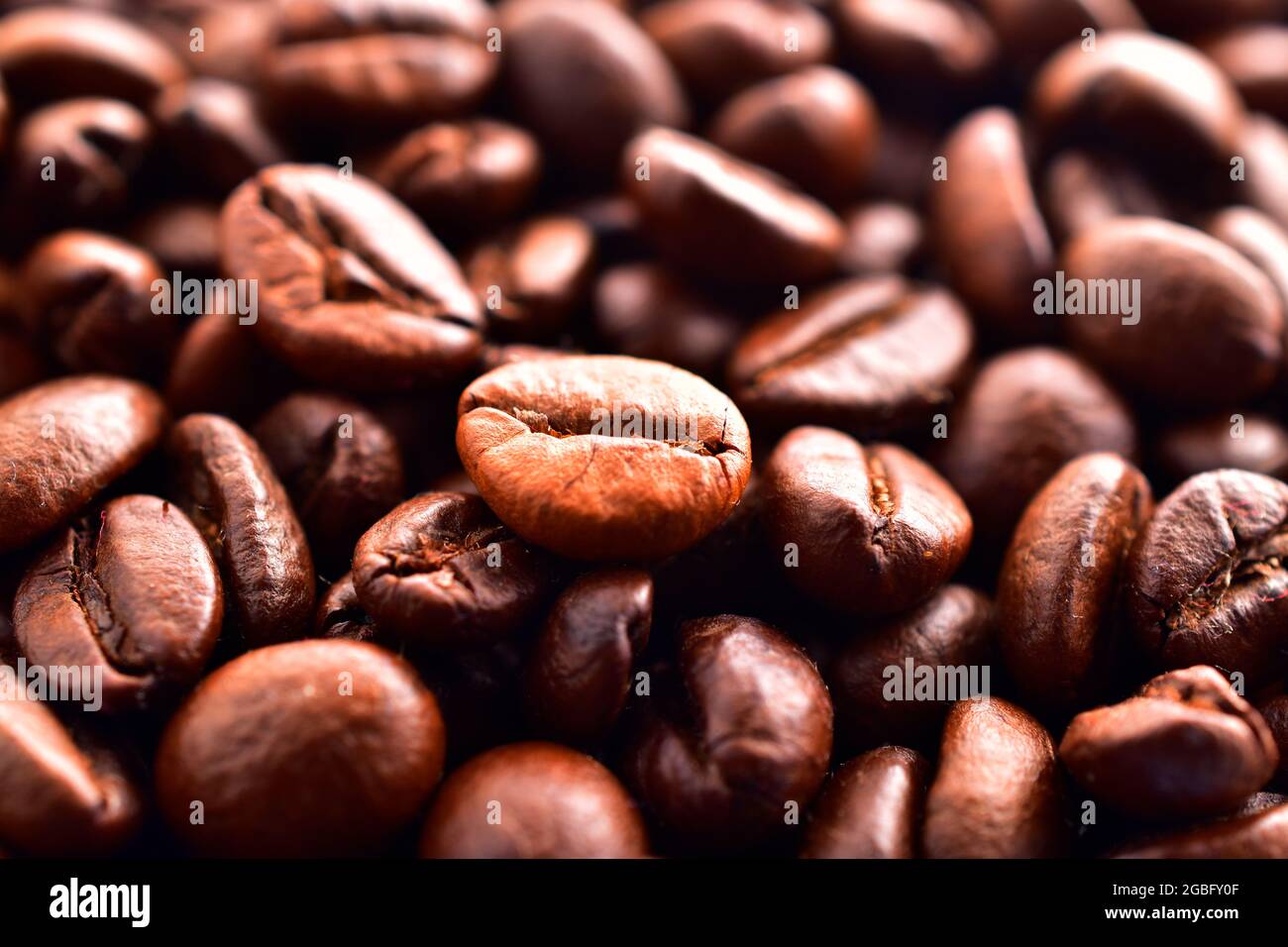 grani di caffè arrosto sfondo texture, chicchi di caffè Foto Stock