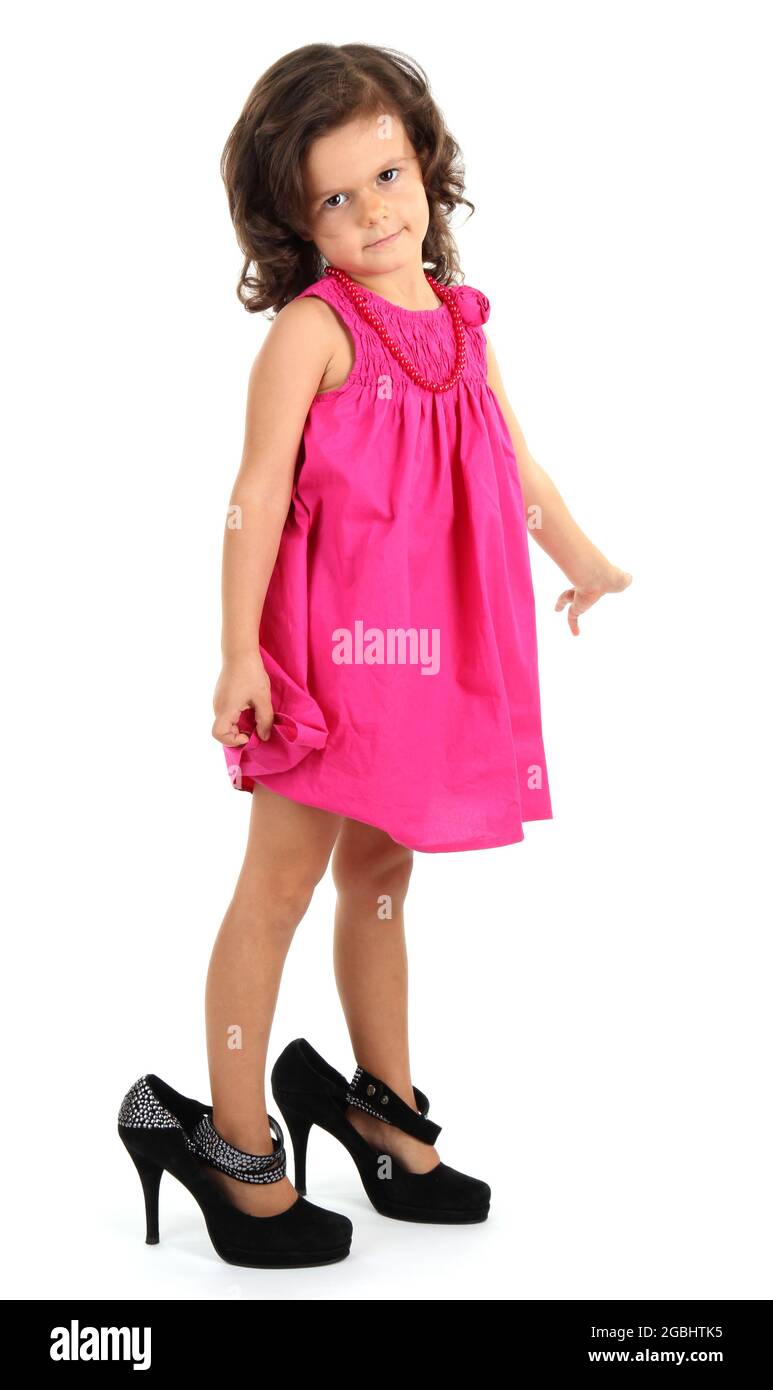 bella bambina in scarpe grandi isolato su bianco Foto stock Alamy