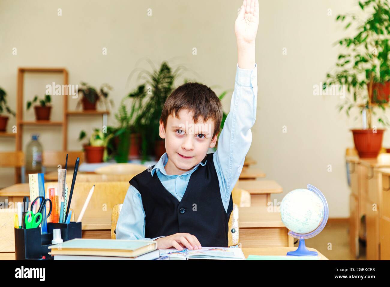 Scolaro in classe. Concetto di istruzione e formazione. Foto Stock