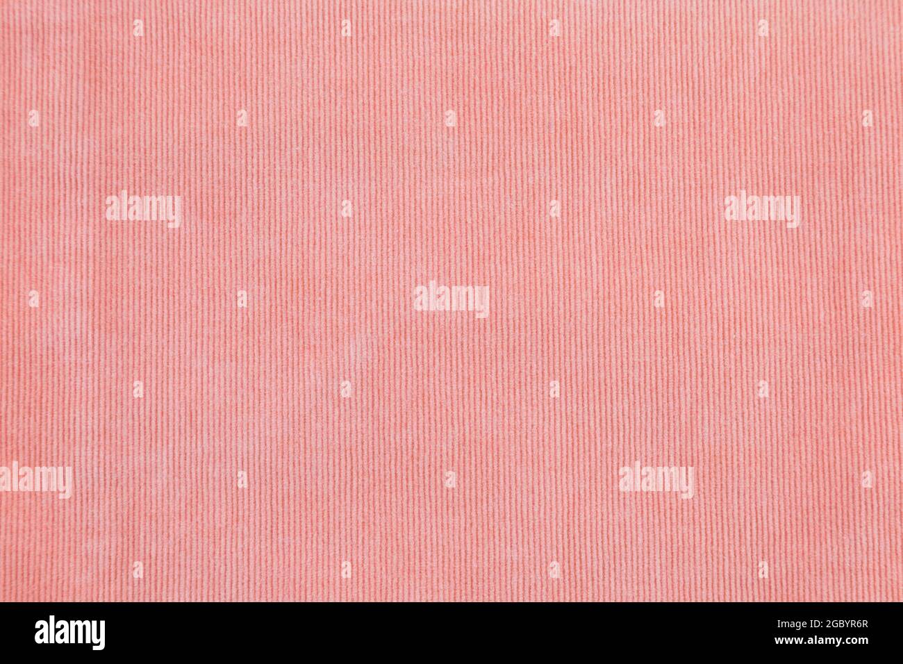 tessuto di colore arancio e rosa da un materiale tessile per sfondo astratto Foto Stock