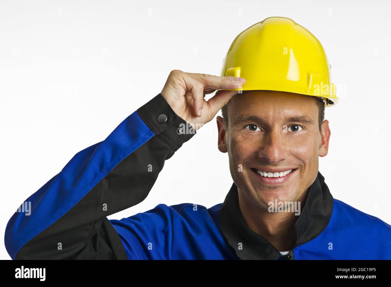 lavoratore di collare blu con elmetto Foto Stock