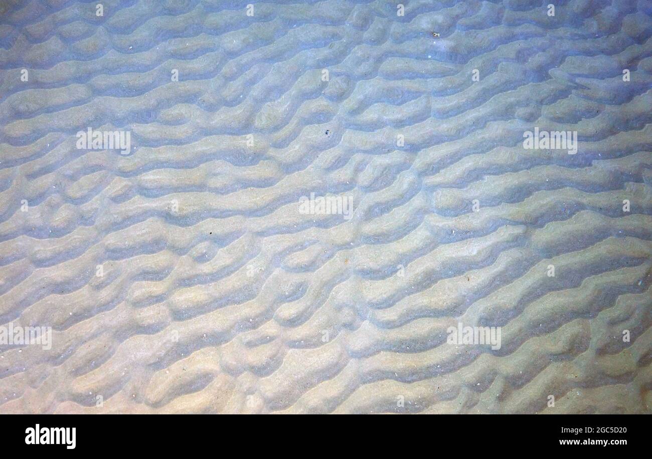 La sabbia si increspa sott'acqua Foto Stock