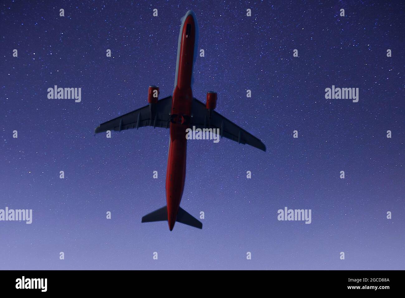 Aereo passeggeri intorno alle stelle Foto Stock