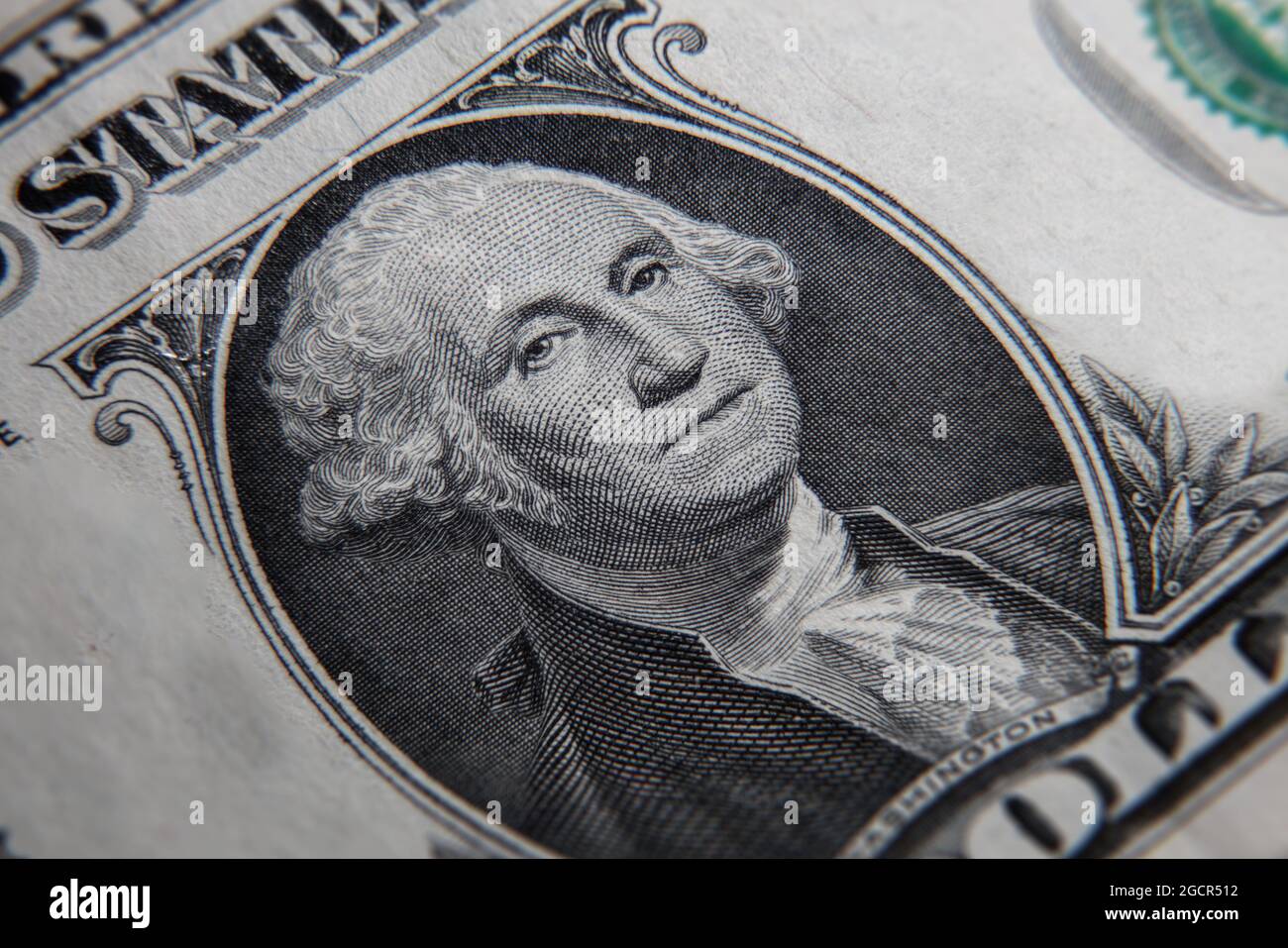 Macro primo piano di una banconota da 1 dollaro USA. Primo piano di una nota del dollaro americano. Il dollaro AMERICANO è la valuta mondiale. Il ritratto di George Washington, Foto Stock