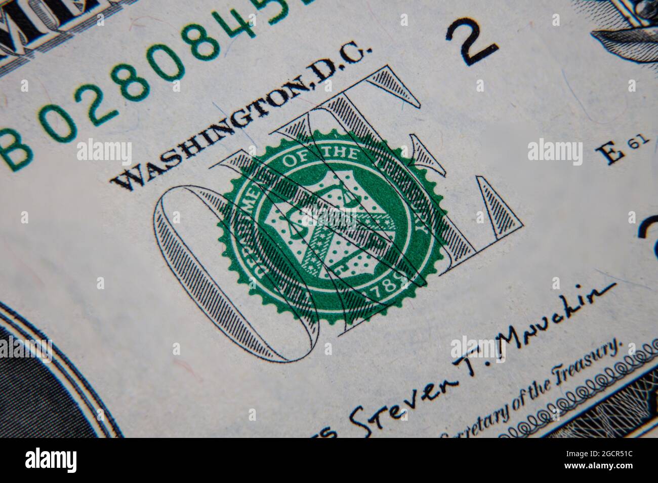 Macro primo piano di una banconota da 1 dollaro USA. Primo piano di una nota del dollaro americano. Il dollaro AMERICANO è la valuta mondiale. Il ritratto di George Washington, Foto Stock