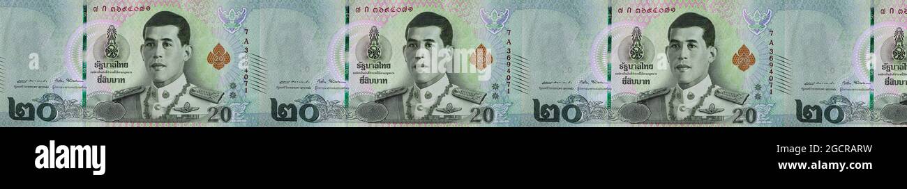 Fotografia macro di una fila di banconote da 20 baht thailandesi. Primo piano dettagliato sui dettagli delle banconote in Thailandia. Il denaro della Thailandia. Venti Baht, p. Foto Stock