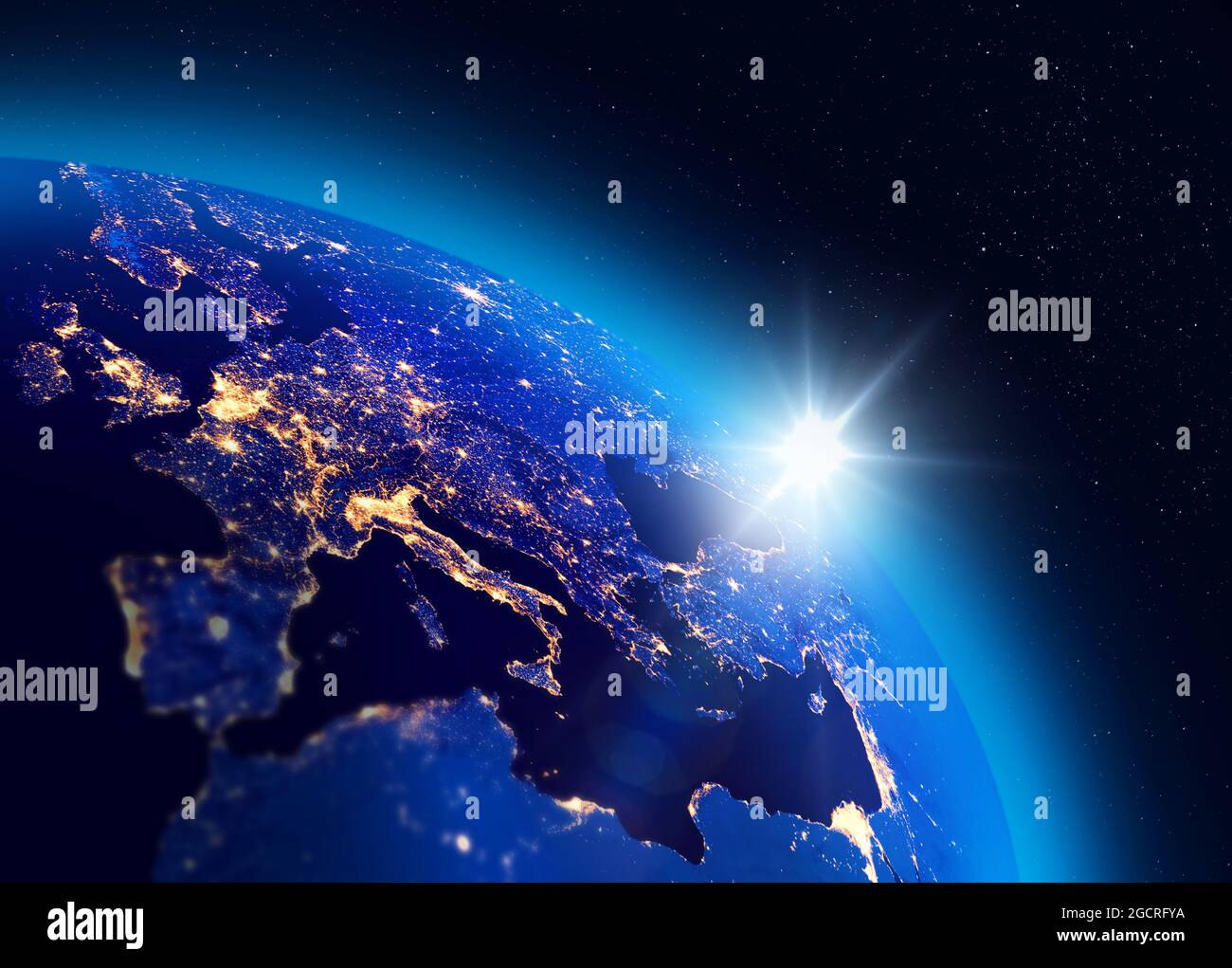 Illustrazione dell'alba sul pianeta Terra, luci della città europea visibili. Concetto di consumo energetico. Alcuni elementi dell'immagine fornita dalla NASA. Foto Stock