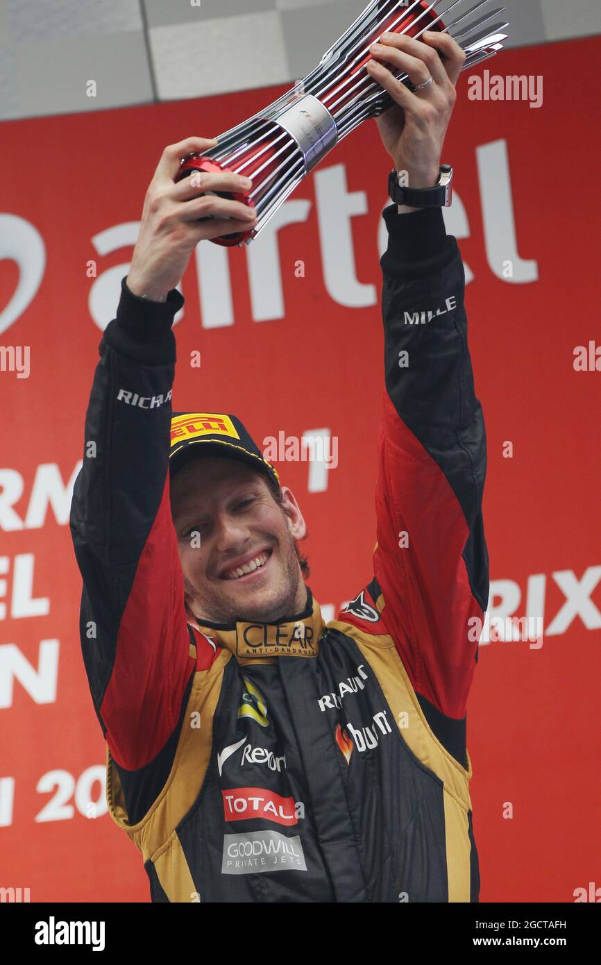 Romain Grosjean (fra) Lotus F1 Team festeggia la sua terza posizione sul podio. Gran Premio d'India, domenica 27 ottobre 2013. Grande Noida, Nuova Delhi, India. Foto Stock