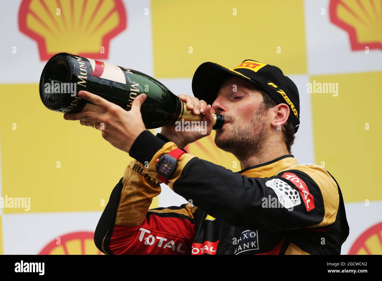 Romain Grosjean (fra) Lotus F1 Team festeggia la sua terza posizione sul podio. Gran Premio del Belgio, domenica 23 agosto 2015. Spa-Francorchamps, Belgio. Foto Stock