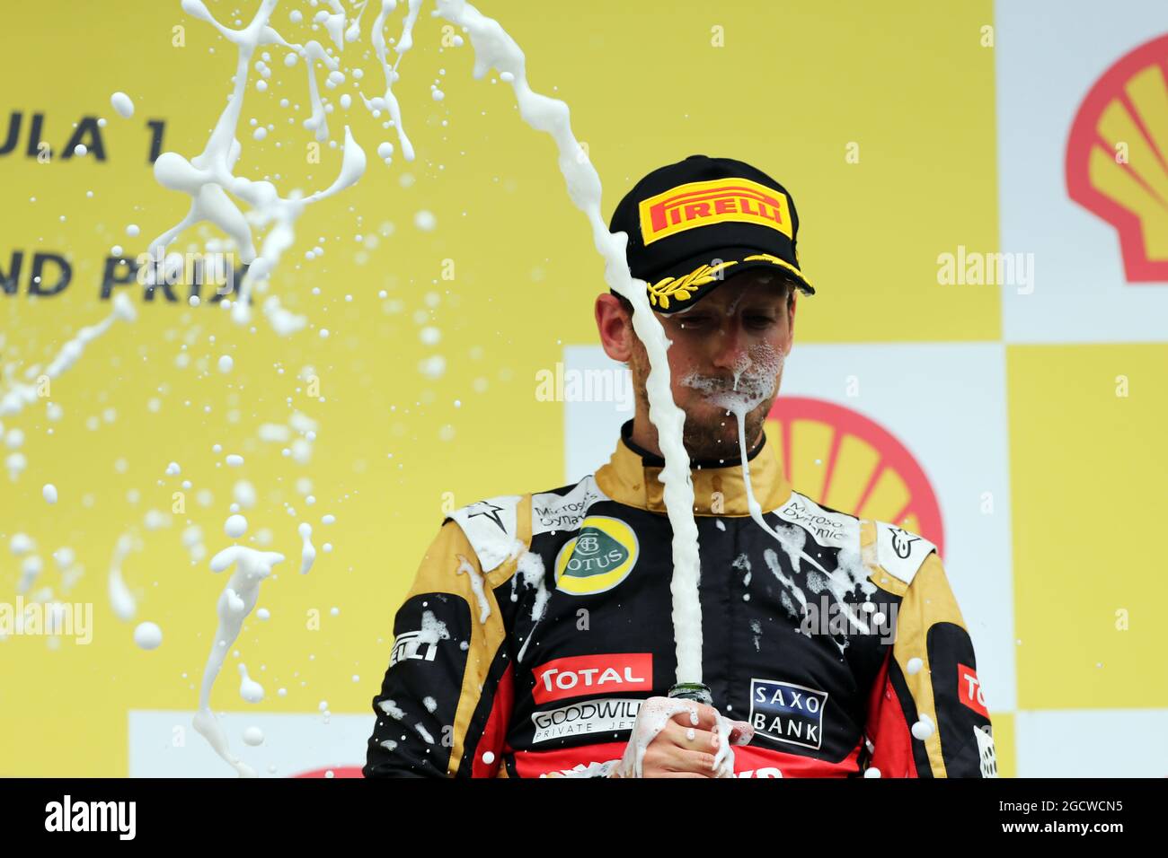 Romain Grosjean (fra) Lotus F1 Team festeggia la sua terza posizione sul podio. Gran Premio del Belgio, domenica 23 agosto 2015. Spa-Francorchamps, Belgio. Foto Stock