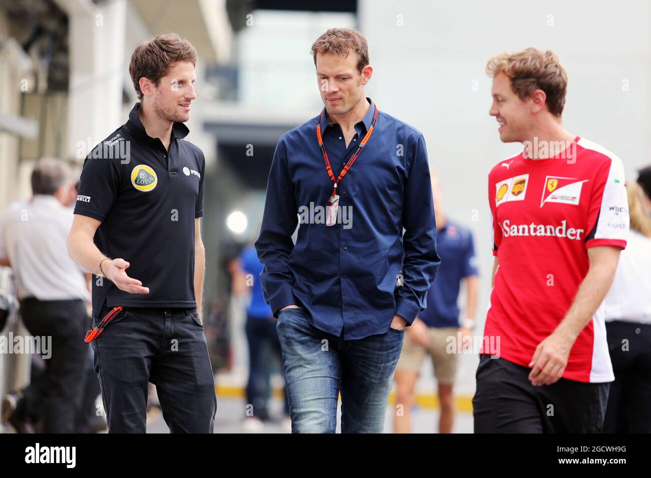 (Da L a R): Romain Grosjean (fra) Lotus F1 Team con Alex Wurz (AUT) Williams driver Mentor/GPDA Presidente e Sebastian Vettel (GER) Ferrari. Gran Premio del Brasile, venerdì 13 novembre 2015. San Paolo, Brasile. Foto Stock