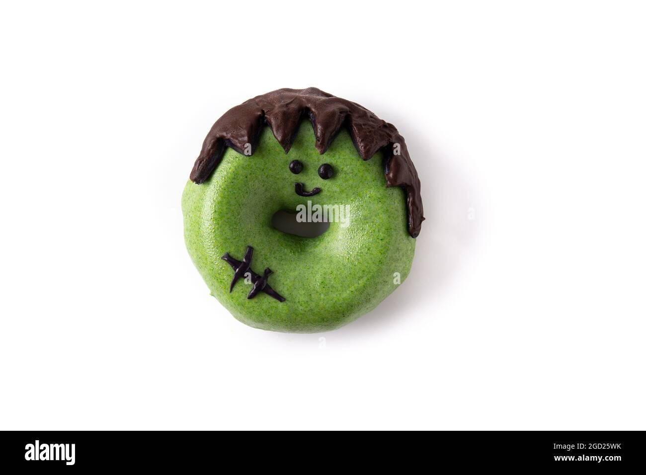 Donut mostro verde per la festa di Halloween Foto Stock