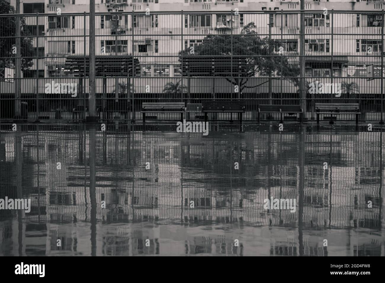 Città sotto la pioggia Foto Stock