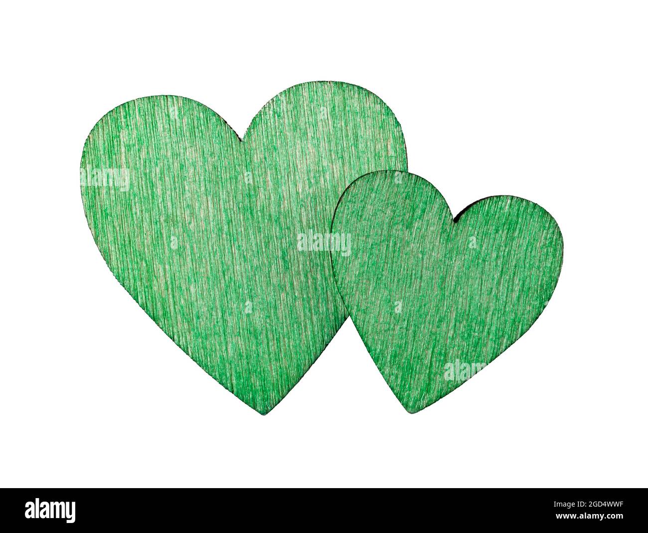 Coppia di cuori valentini verdi in legno isolati su sfondo bianco. Vivere il concetto di verde per amore e la convivenza. Vacanze, cartolina, biglietto d'auguri. Foto Stock