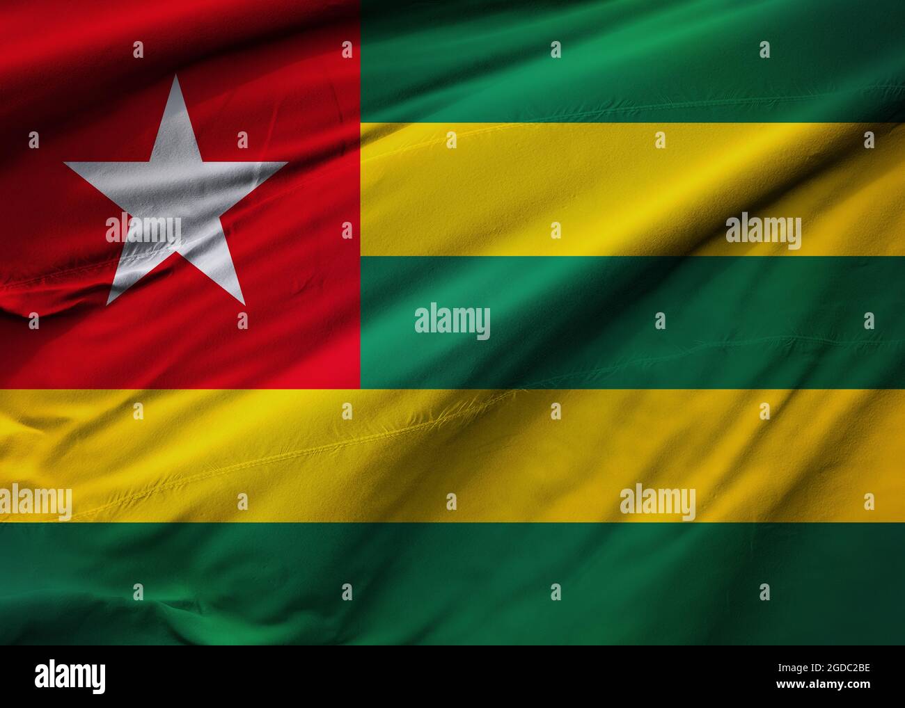 Bandiera della Repubblica Togolese che soffia nel vento. Texture di sfondo. Lomé. Illustrazione 3d. Rendering 3d. Foto Stock