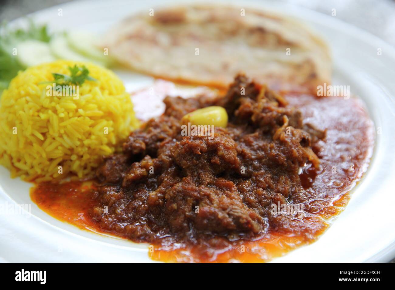 Maiale al curry con riso, curry hinlay Foto Stock