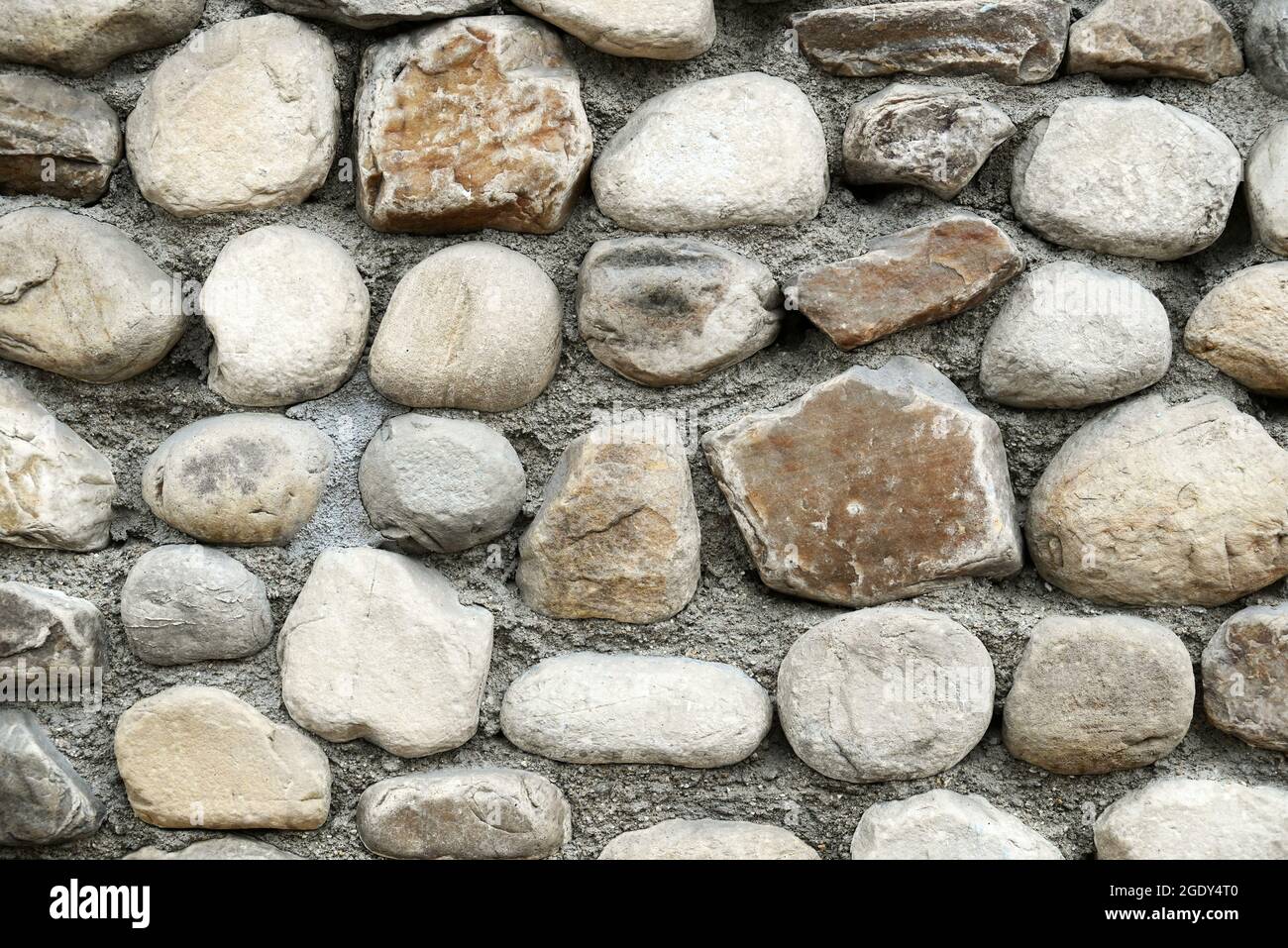 Dettaglio di un muro di pietra. Foto Stock