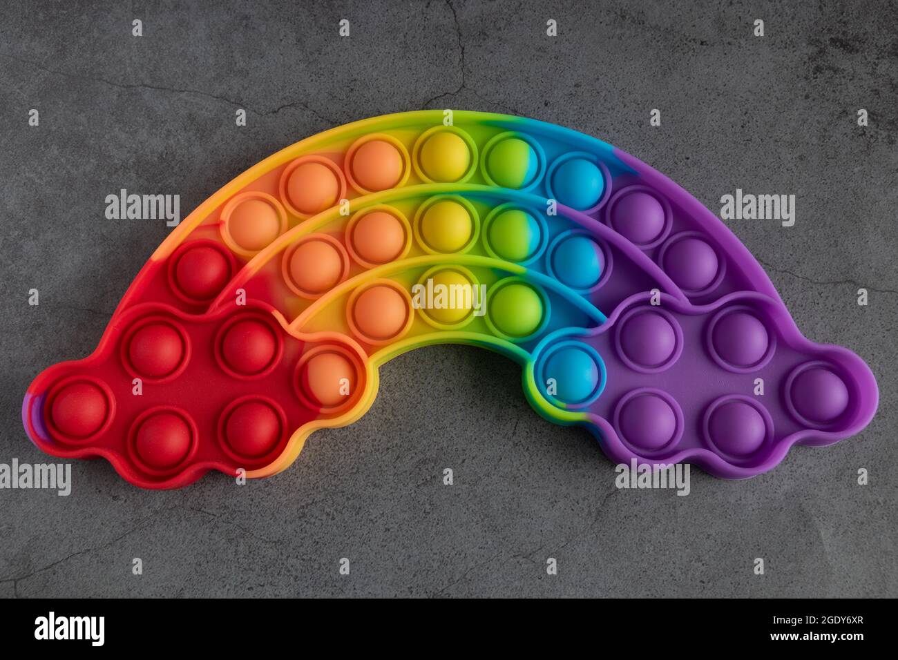 Pop it anti-stress giocattolo sensoriale per bambini e adulti Foto Stock