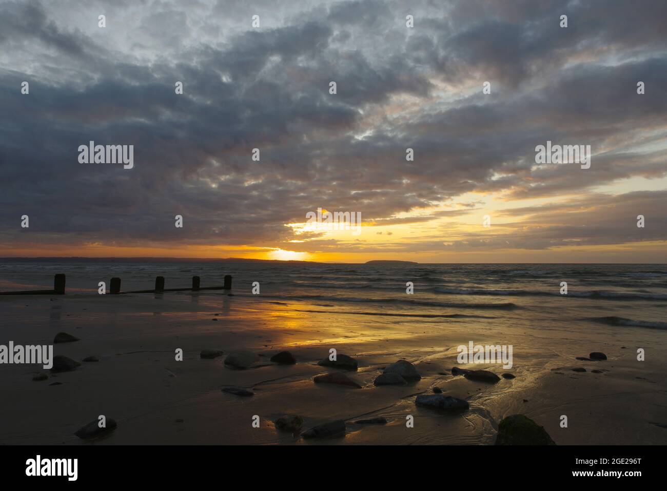 Tramonto, Penmaenmawr Beach, Foto Stock