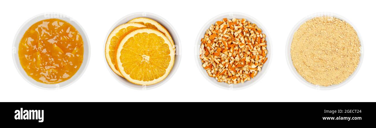 Marmellata d'arancia e arance secche, in ciotole bianche. Marmellata, fette di arancia essiccate, buccia di arance tritate e in polvere. Cucina di Natale e decorazioni. Foto Stock