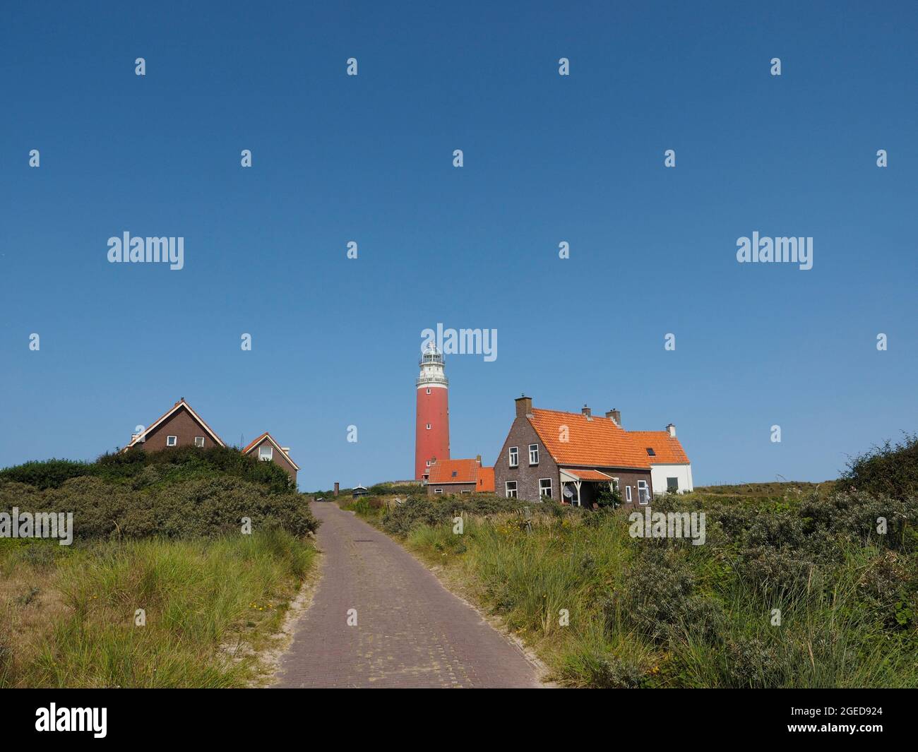 Il faro di de Cocksdorp sulla punta settentrionale dell'isola di Texel, Paesi Bassi Foto Stock