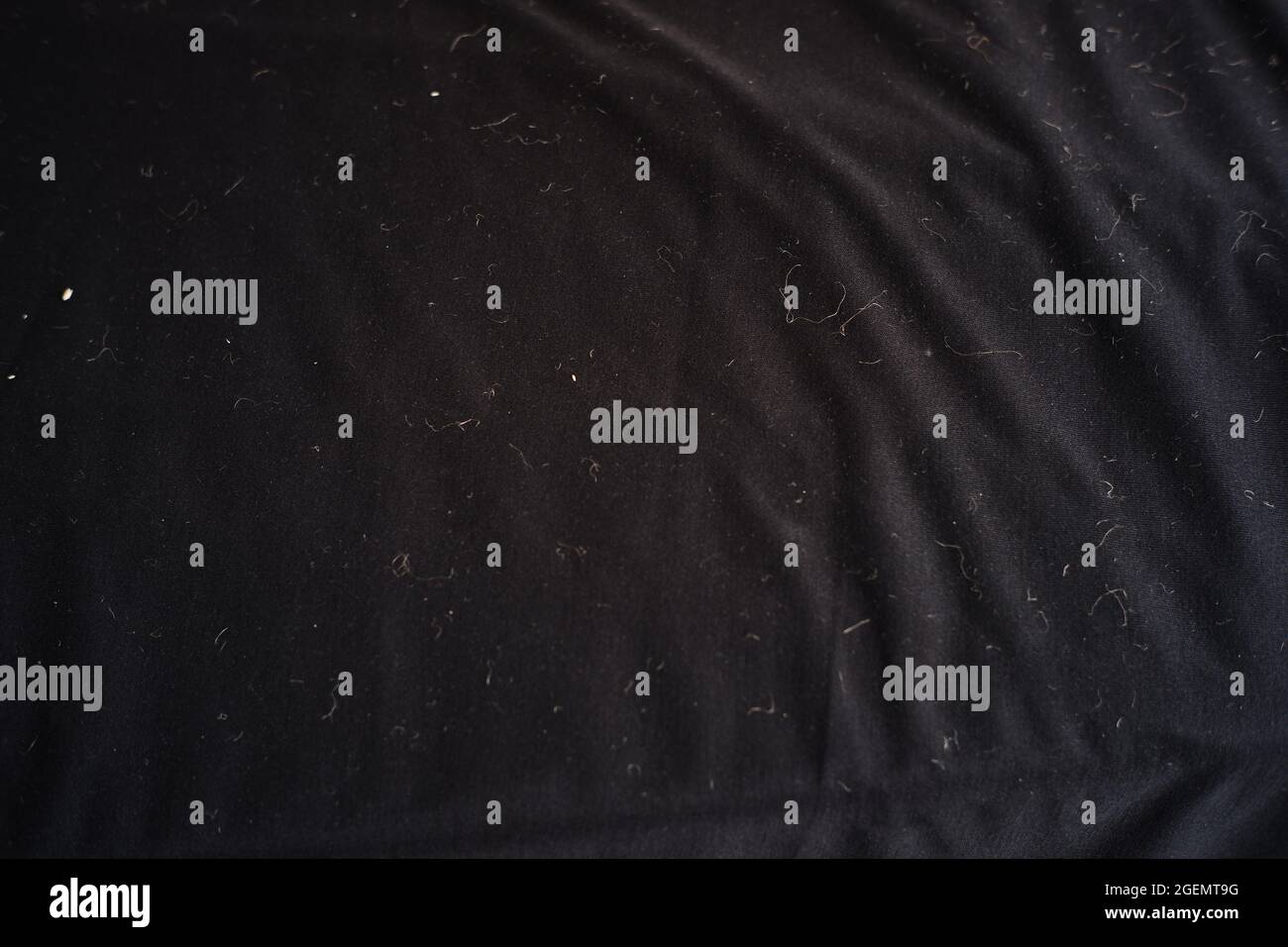 tessuto nero sporco e disordinato. panno morbido per scrivere sfondo, materiale di design o decorazione. tessuto ondulato Foto Stock