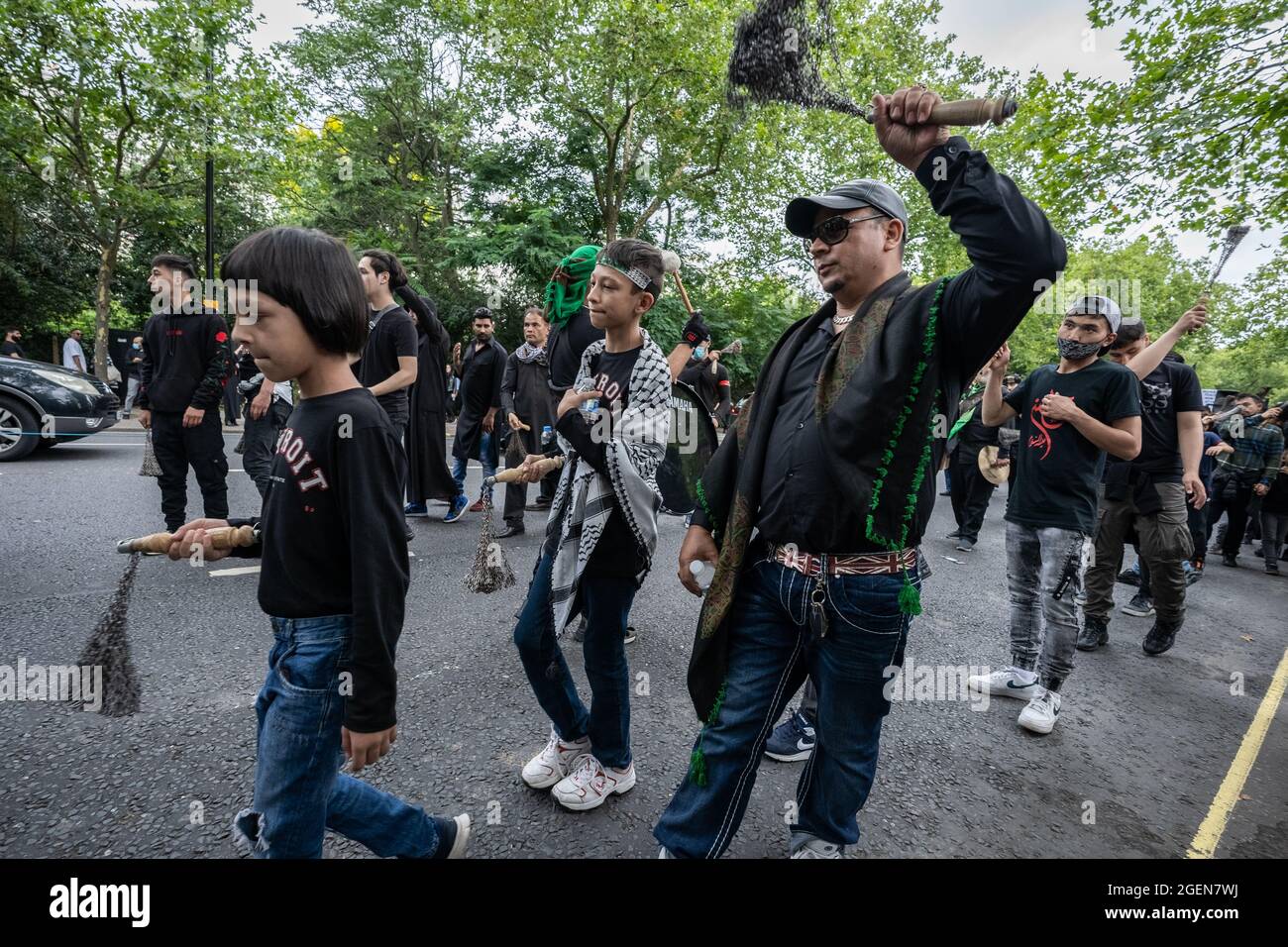 Centinaia di musulmani sciiti partecipano all'annuale Ashura Day Procession. Hyde Park, Londra, Regno Unito. Foto Stock