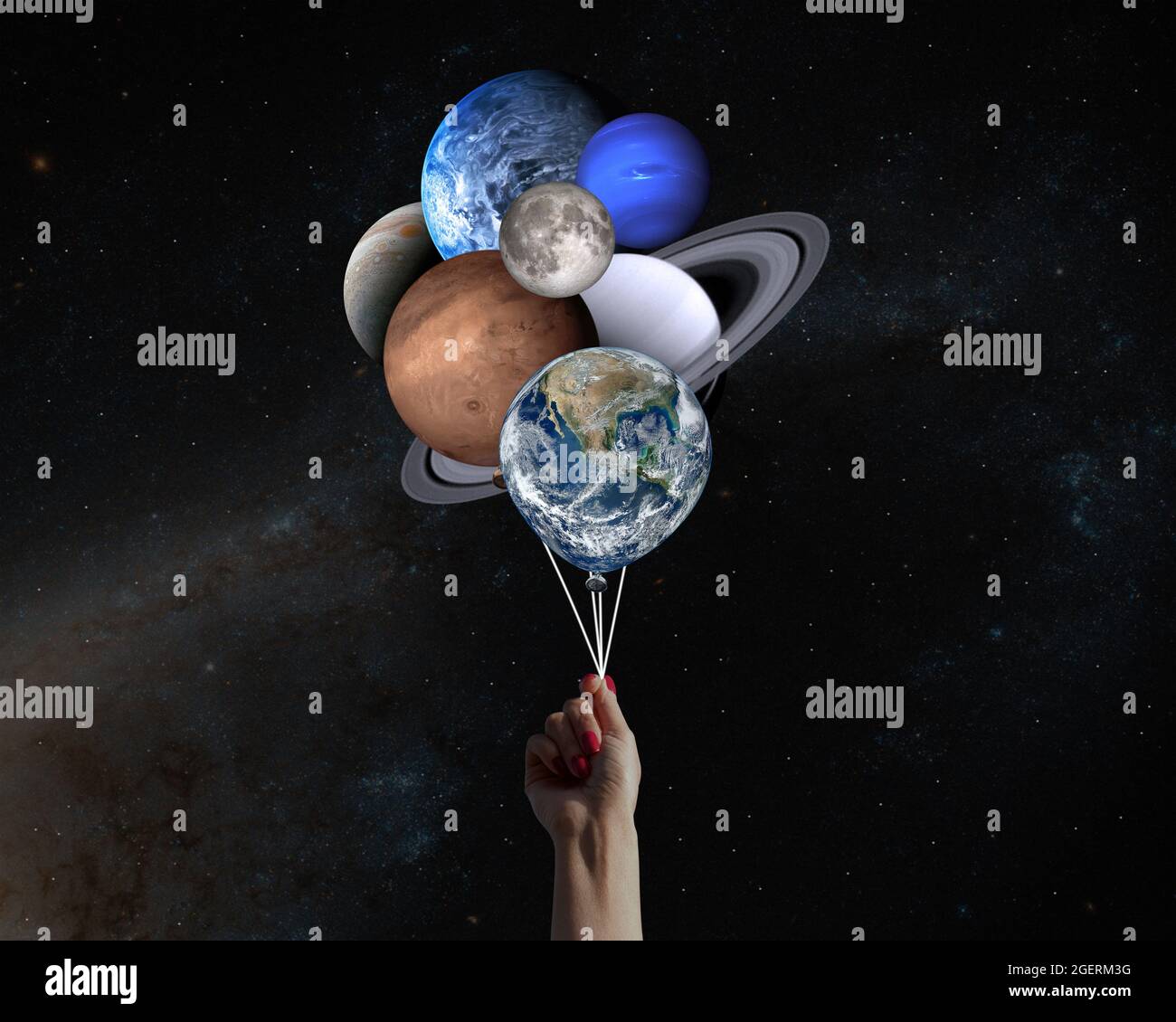 Mano con pianeti a forma di palloncini nel sistema solare. Elementi di questa immagine forniti dalla NASA. Foto Stock