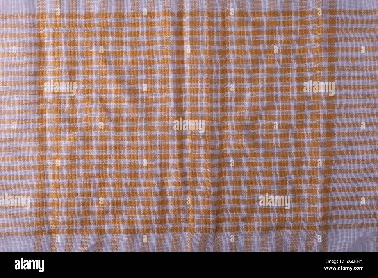 texture of beige plaid panno dishcloth close-up Foto Stock