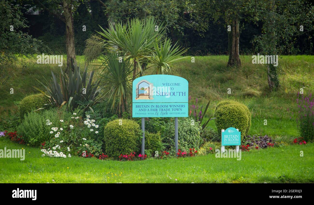 Segno di benvenuto visitatori a Sidmouth, nel Devon orientale, una città balneare della reggenza Foto Stock