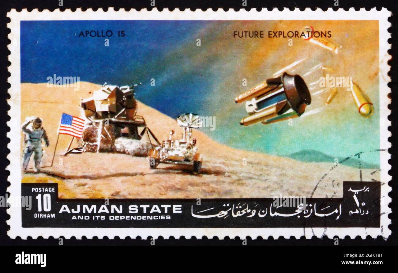 AJMAN - CIRCA 1972: Un francobollo stampato nell'Ajman mostra Luna-atterraggio, Apollo 15, Missione alla Luna, circa 1972 Foto Stock