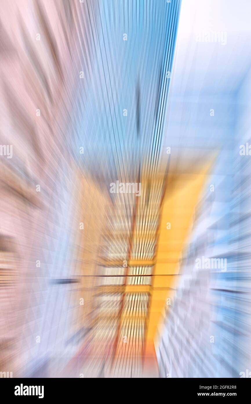 Movimento edificio sfocato, astratto sfondo urbano. Foto Stock