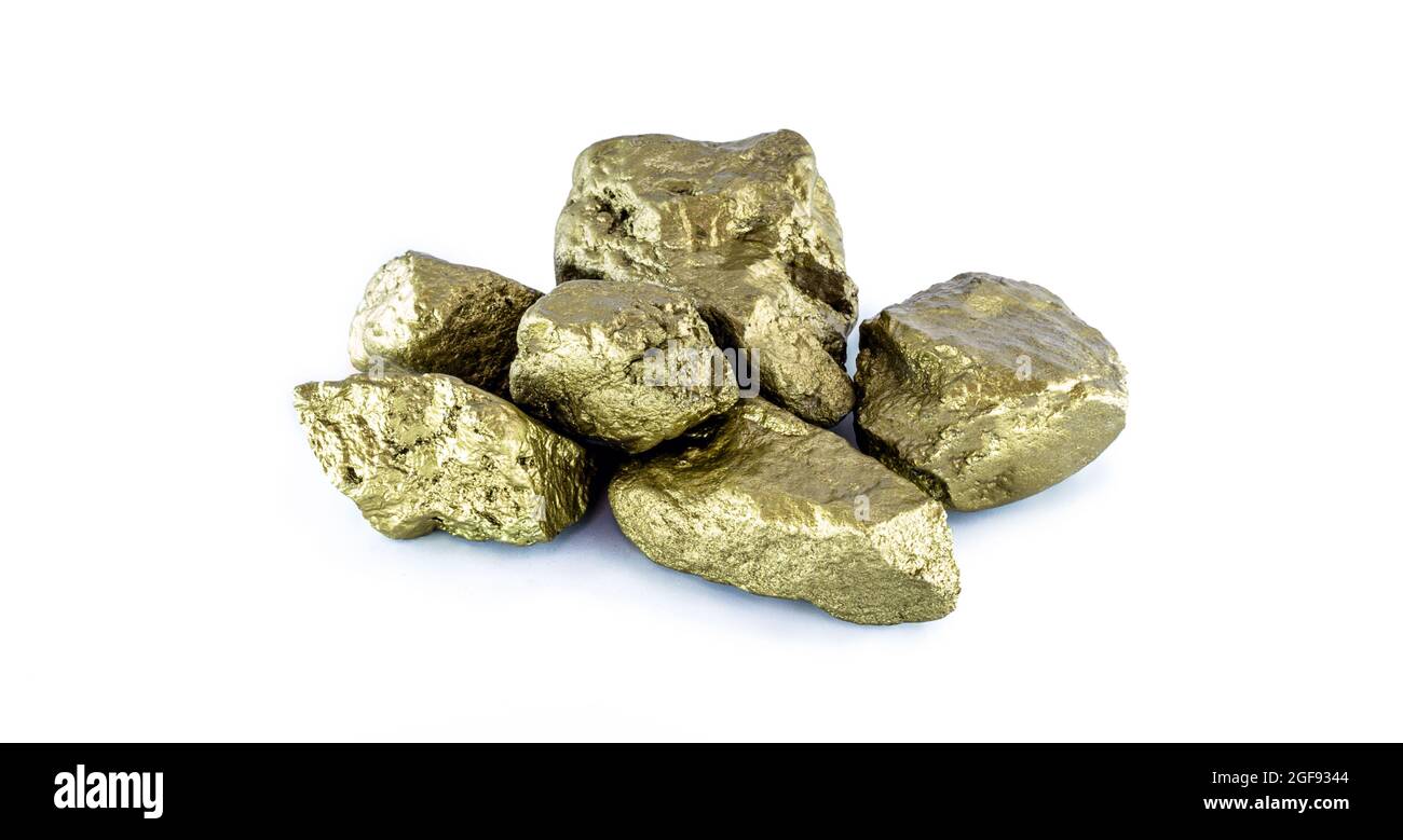 pietre d'oro su sfondo bianco isolato. Pietre dorate preziose. Foto Stock