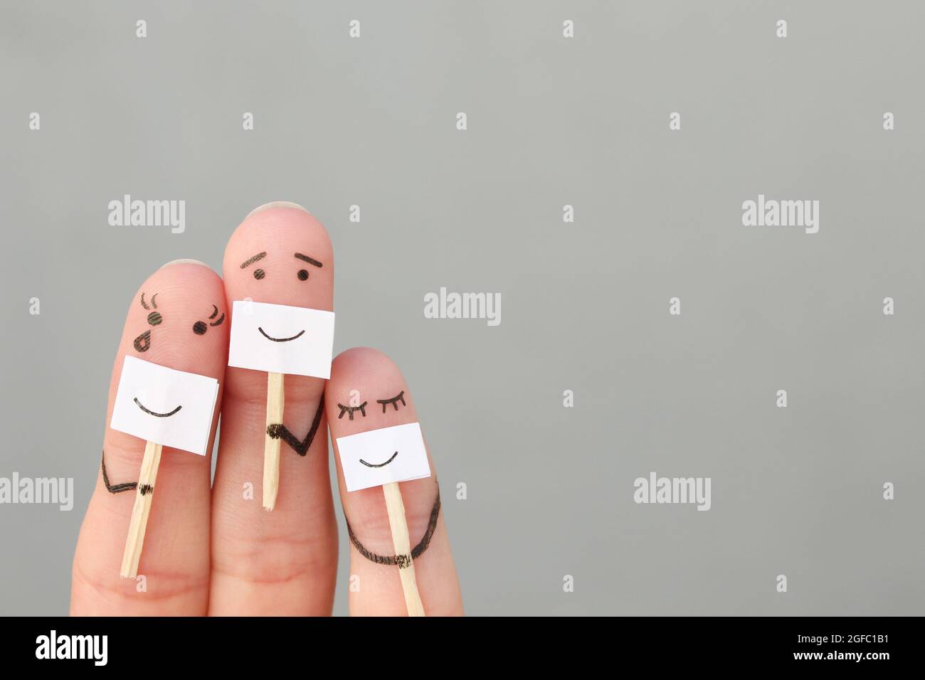 Fingers arte di famiglia. Concetto di persone che nascondono emozioni. Foto Stock