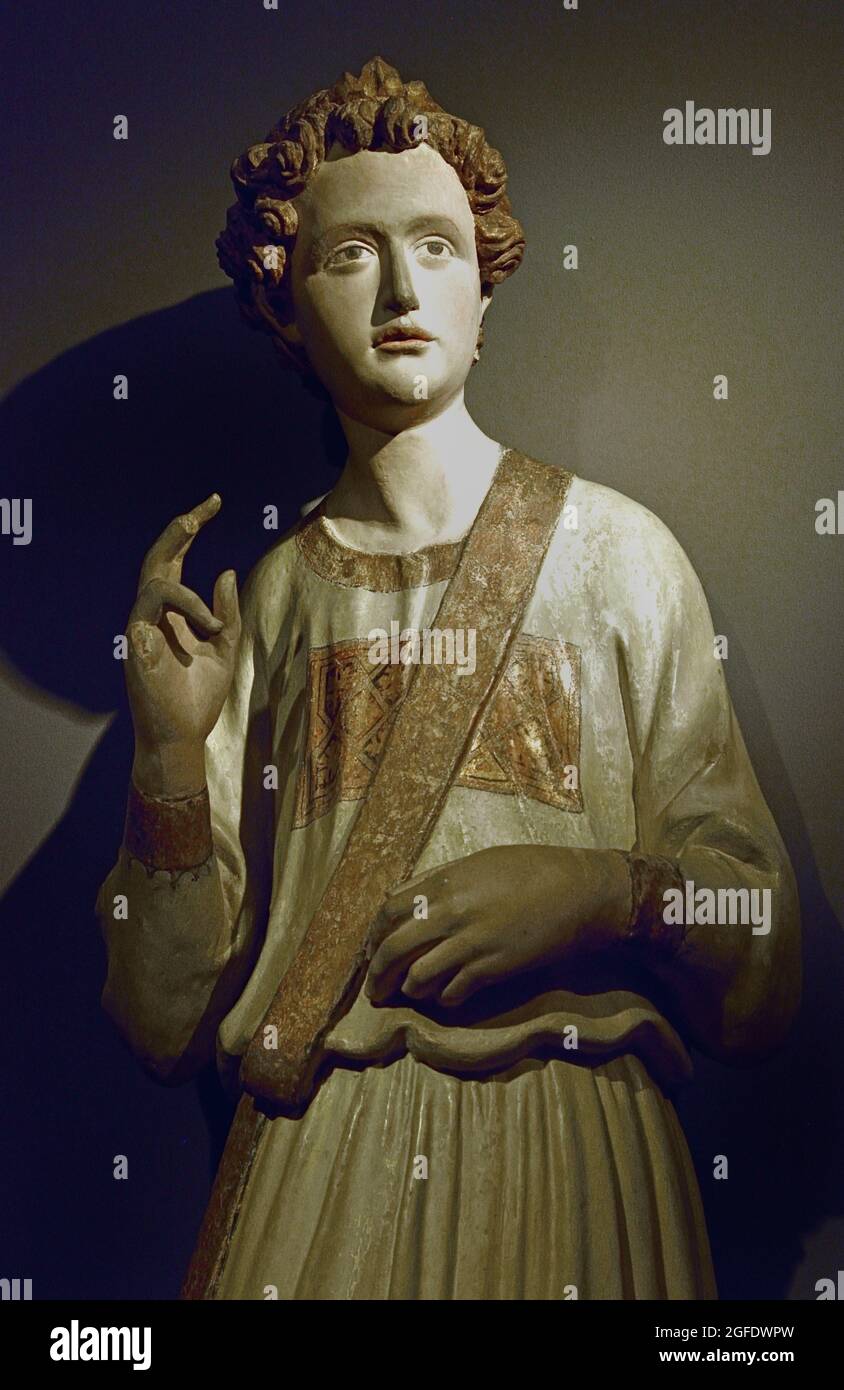 L'Annunciazione a Maria, Francesco di Valdambrino 1423 Italia, italiano, (l'angelo Gabriele sta dicendo alla Vergine che concepirà un bambino. Questo gruppo di figure fu fatto a fianco dell'altare maggiore della chiesa di San Francesco a Pienza (Toscana). Foto Stock